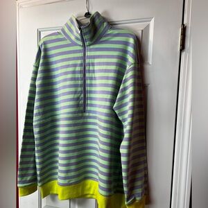Woman's Striped Half-Zip Pullover in Green and Lavender with Yellow Hem.